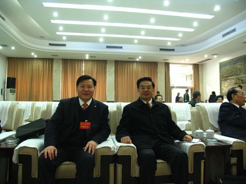 王董與最高人民法院院長、原湖南省省長周強在一起